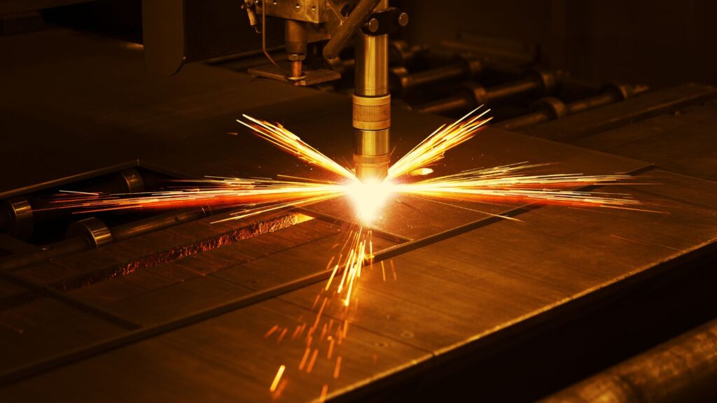 CNC plasma cutting machine yellow sparks