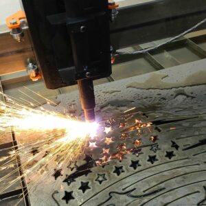 plasma cutting machine cutting out the shape of an american flag